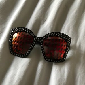 Gucci glasses with lightening bulbs